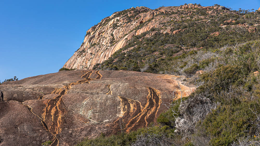 natural patterns on rock face at sleepy bay, freycinet peninsula